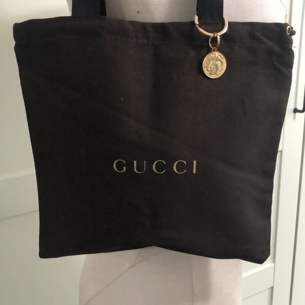 Repurposed Gucci tote with gold Roman coin